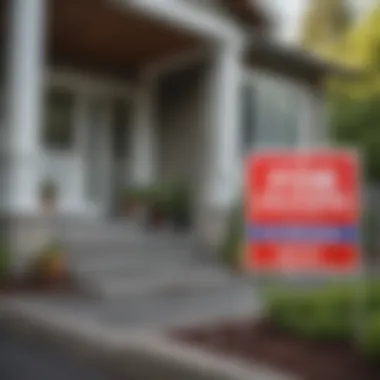 Close-up of a real estate sign in front of a home