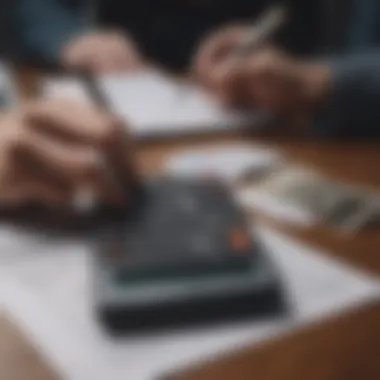 A person analyzing financial data using a calculator and a notebook